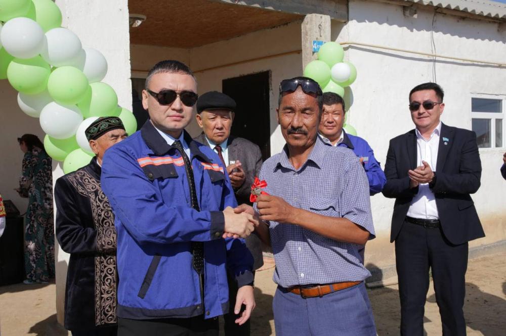 Фото Ембі Мұнайшысы