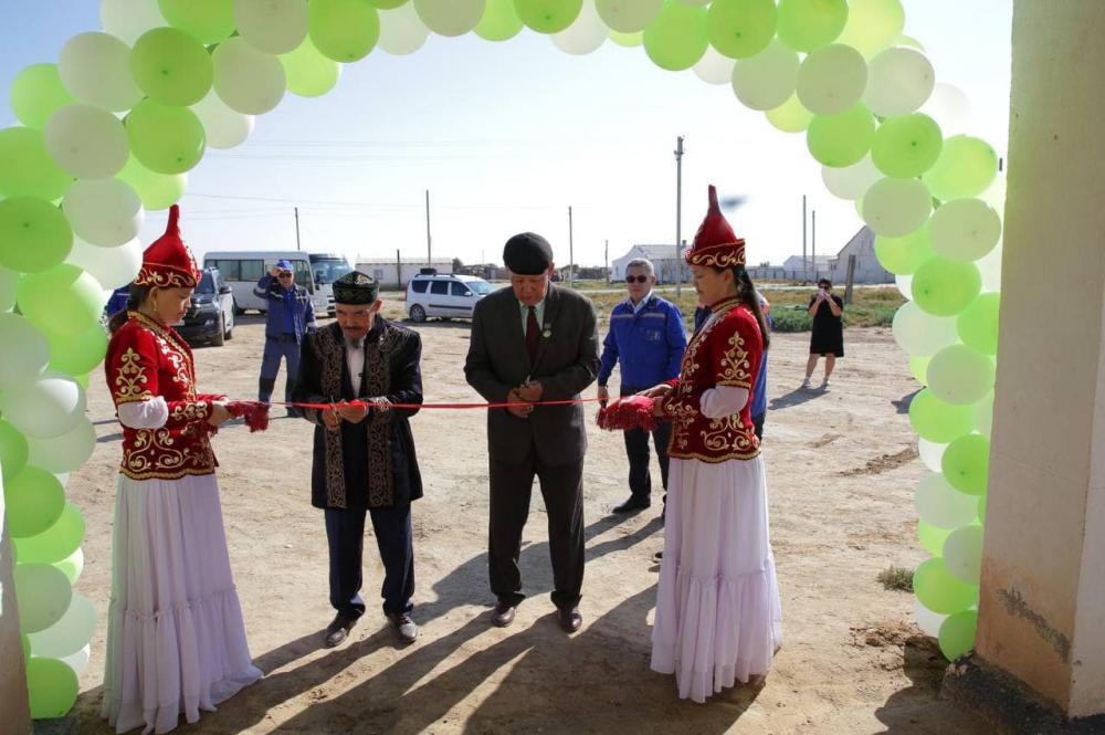 Фото Ембі Мұнайшысы